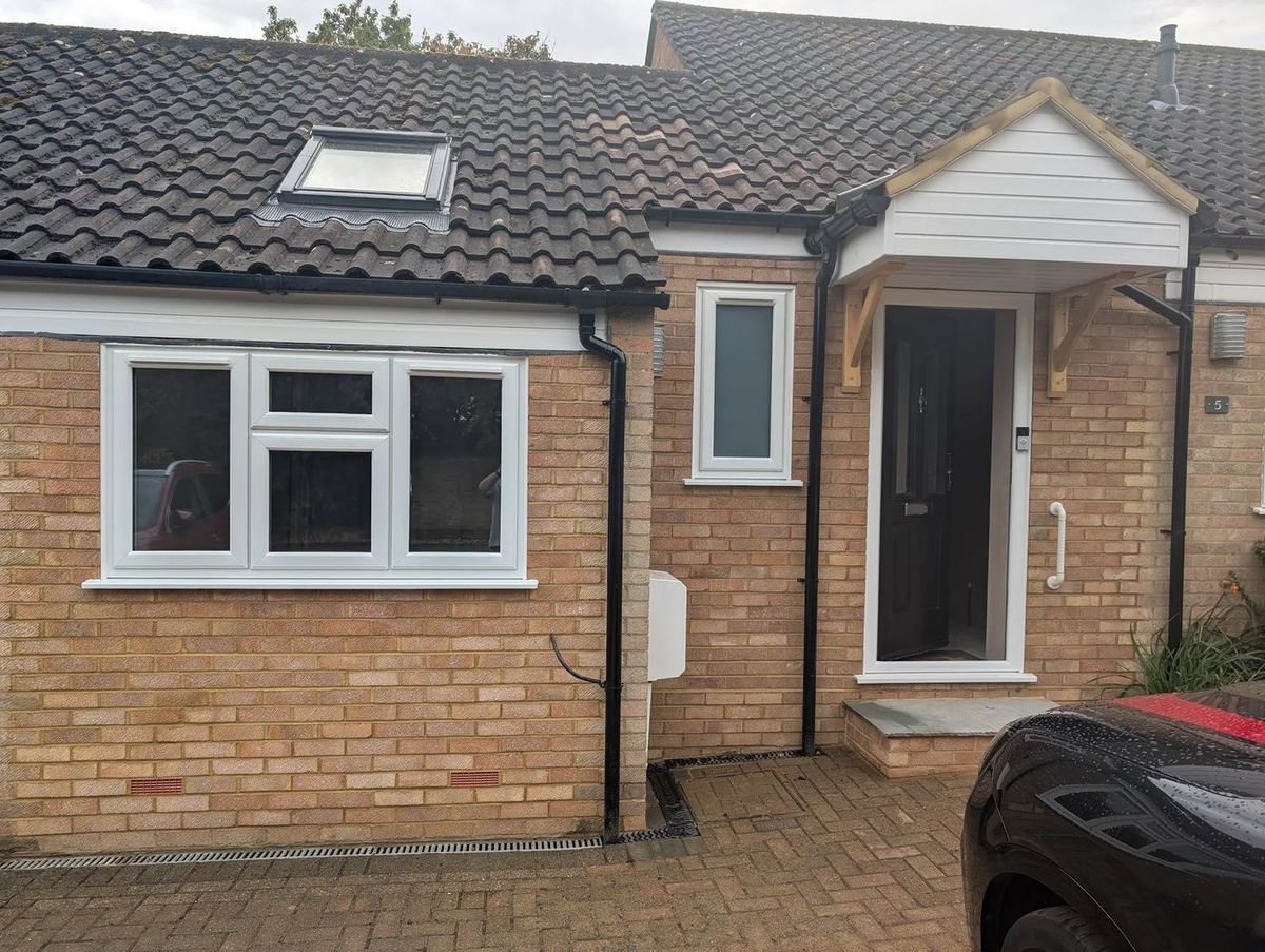 A garage conversion and new porch by W. Pocock & Sons
